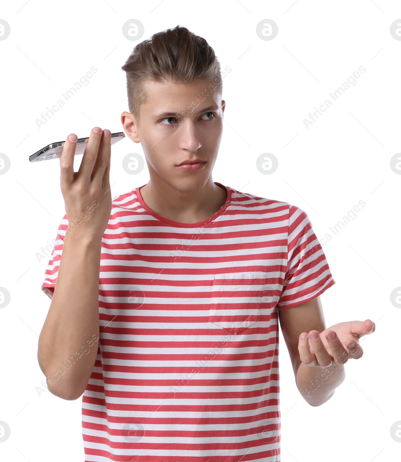 Photo of Young man with smartphone listening to voice message on white background