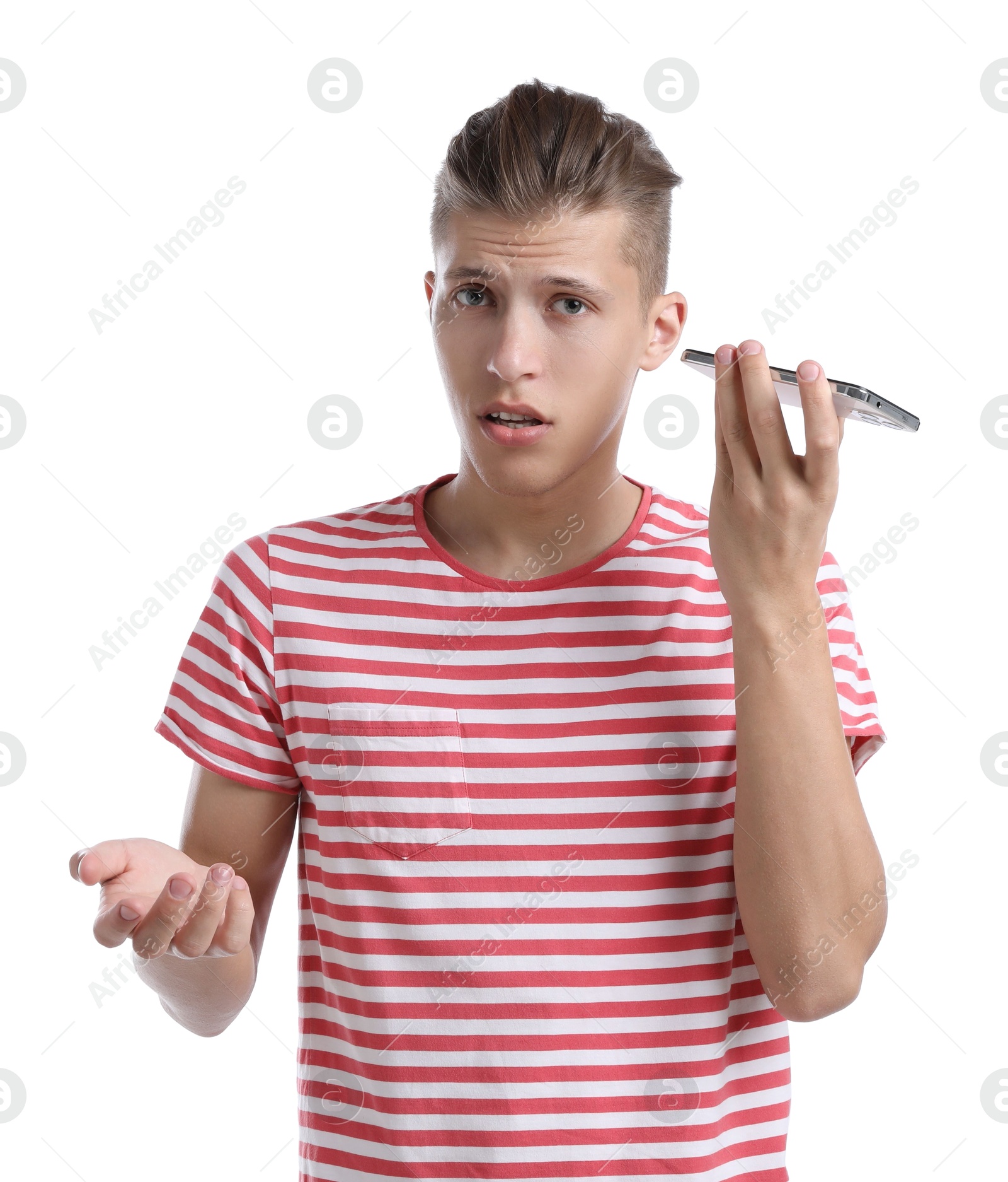 Photo of Young man with smartphone listening to voice message on white background