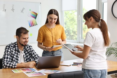 Group of designers working together in office