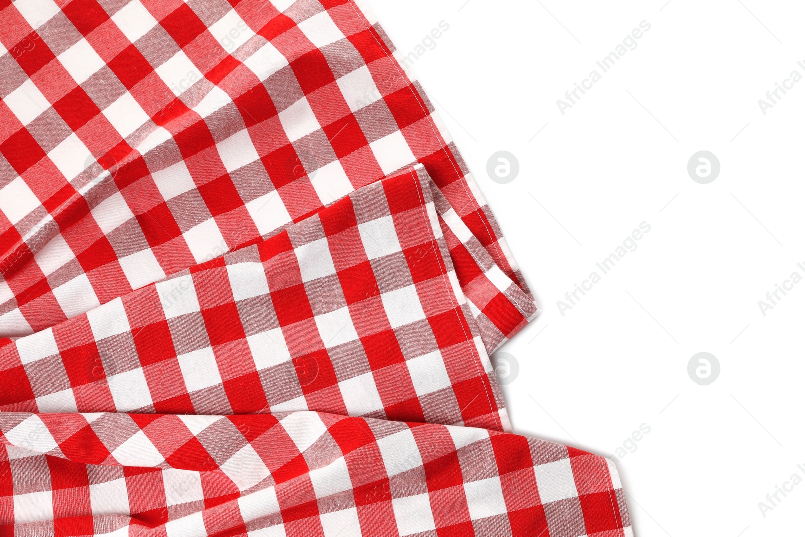 Photo of Crumpled checkered tablecloth isolated on white, top view