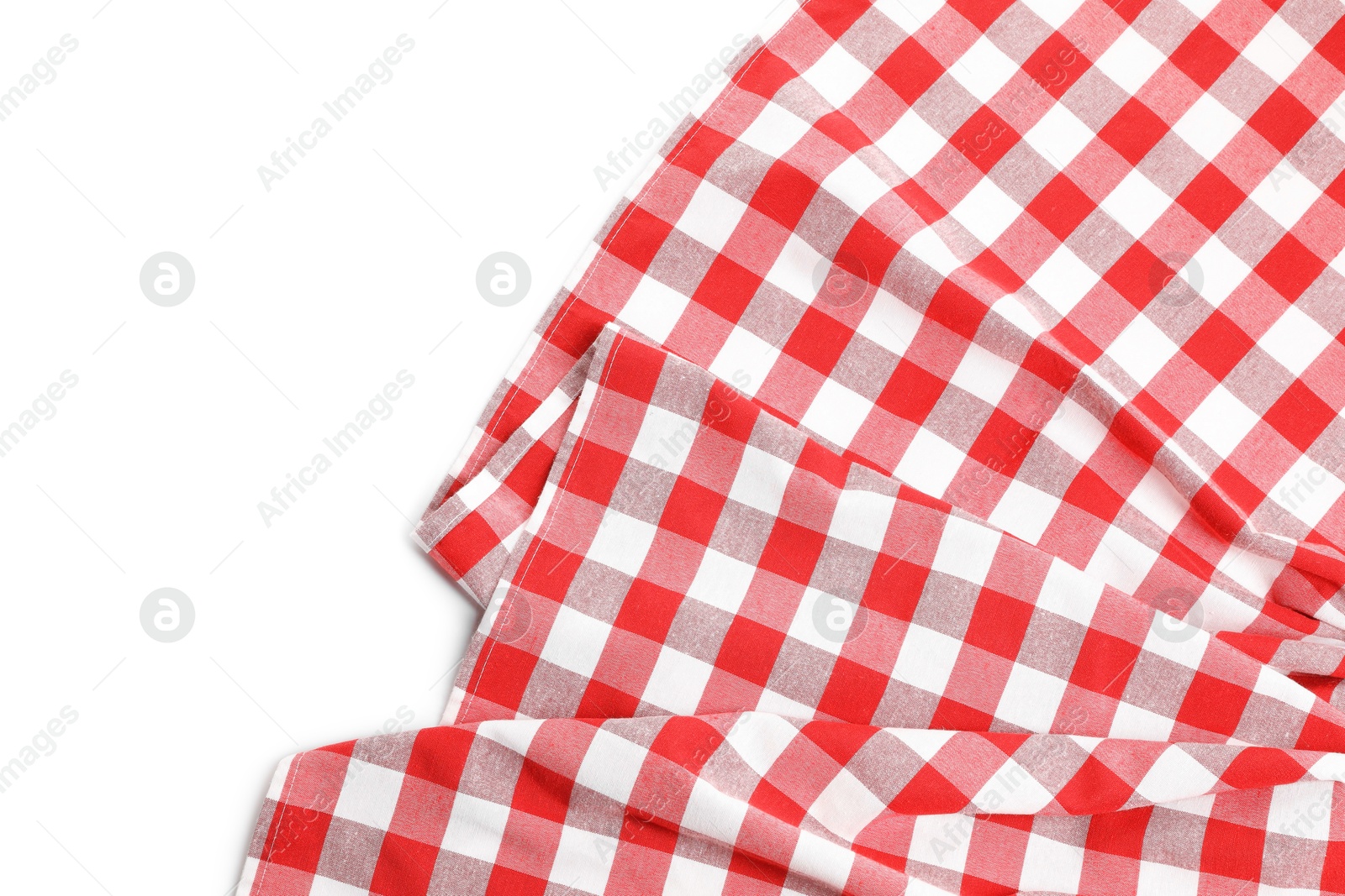 Photo of Crumpled checkered tablecloth isolated on white, top view