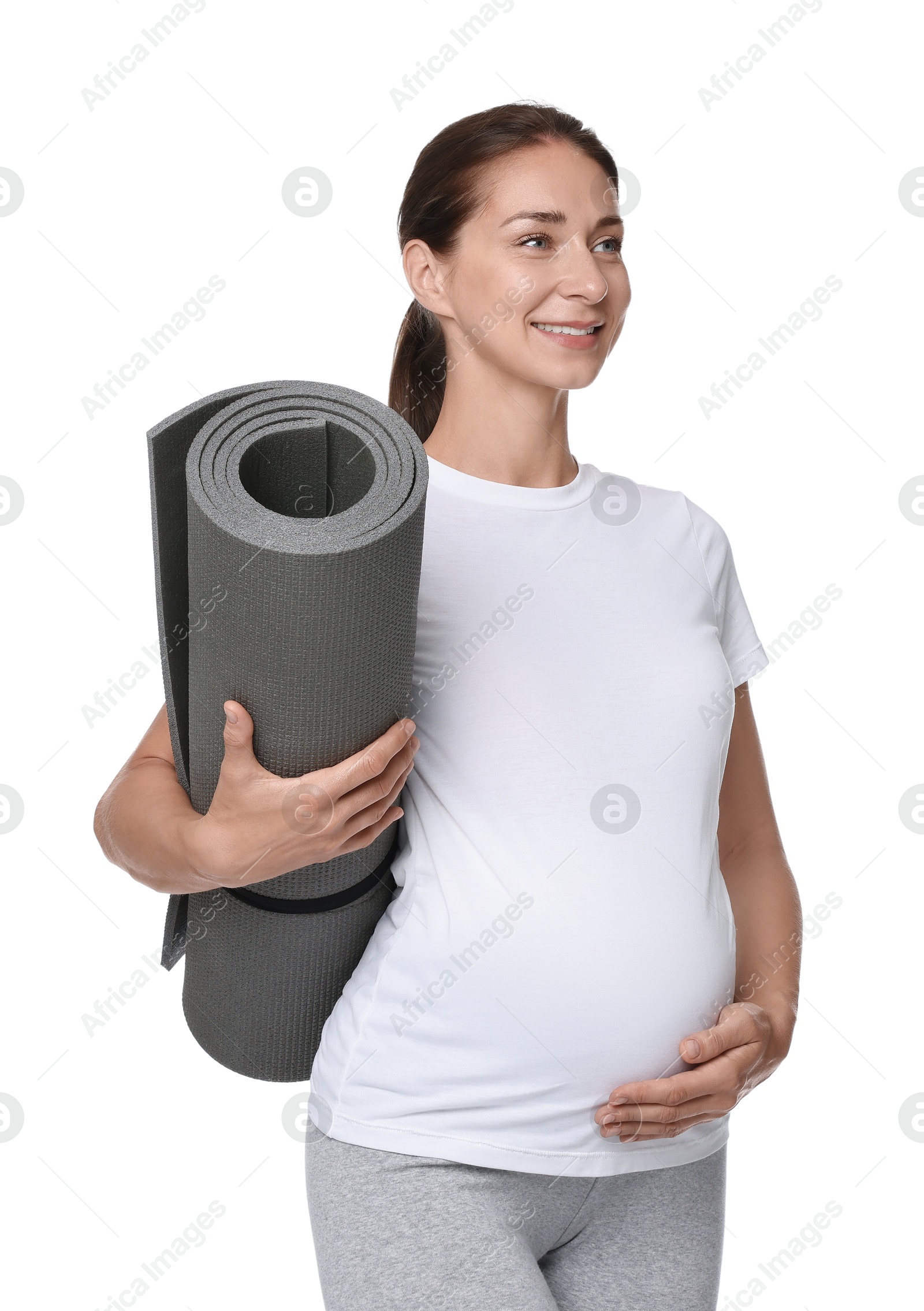 Photo of Beautiful pregnant woman with exercise mat isolated on white