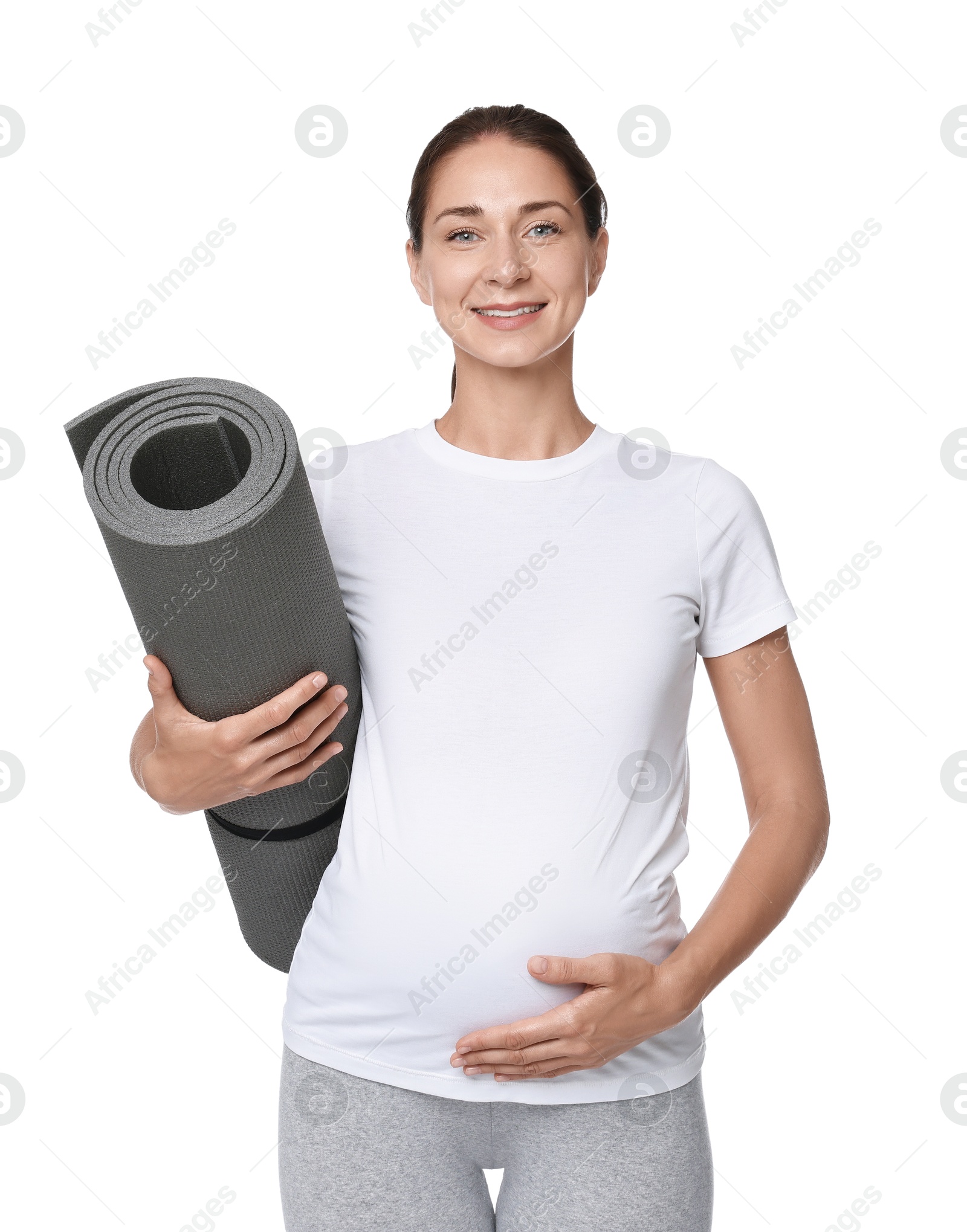 Photo of Beautiful pregnant woman with exercise mat isolated on white