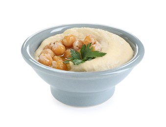 Photo of Delicious hummus with olive oil, chickpeas and parsley isolated on white