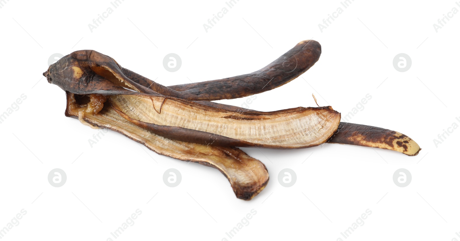 Photo of Banana peel with dark spots isolated on white