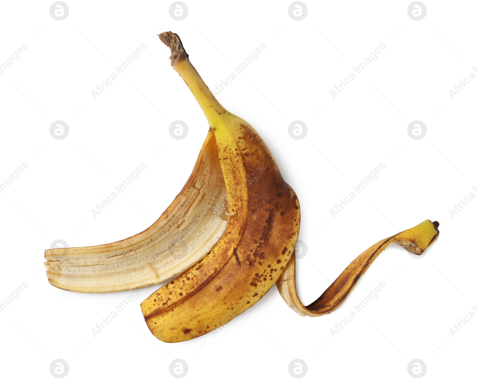 Photo of Banana peel with dark spots isolated on white, top view