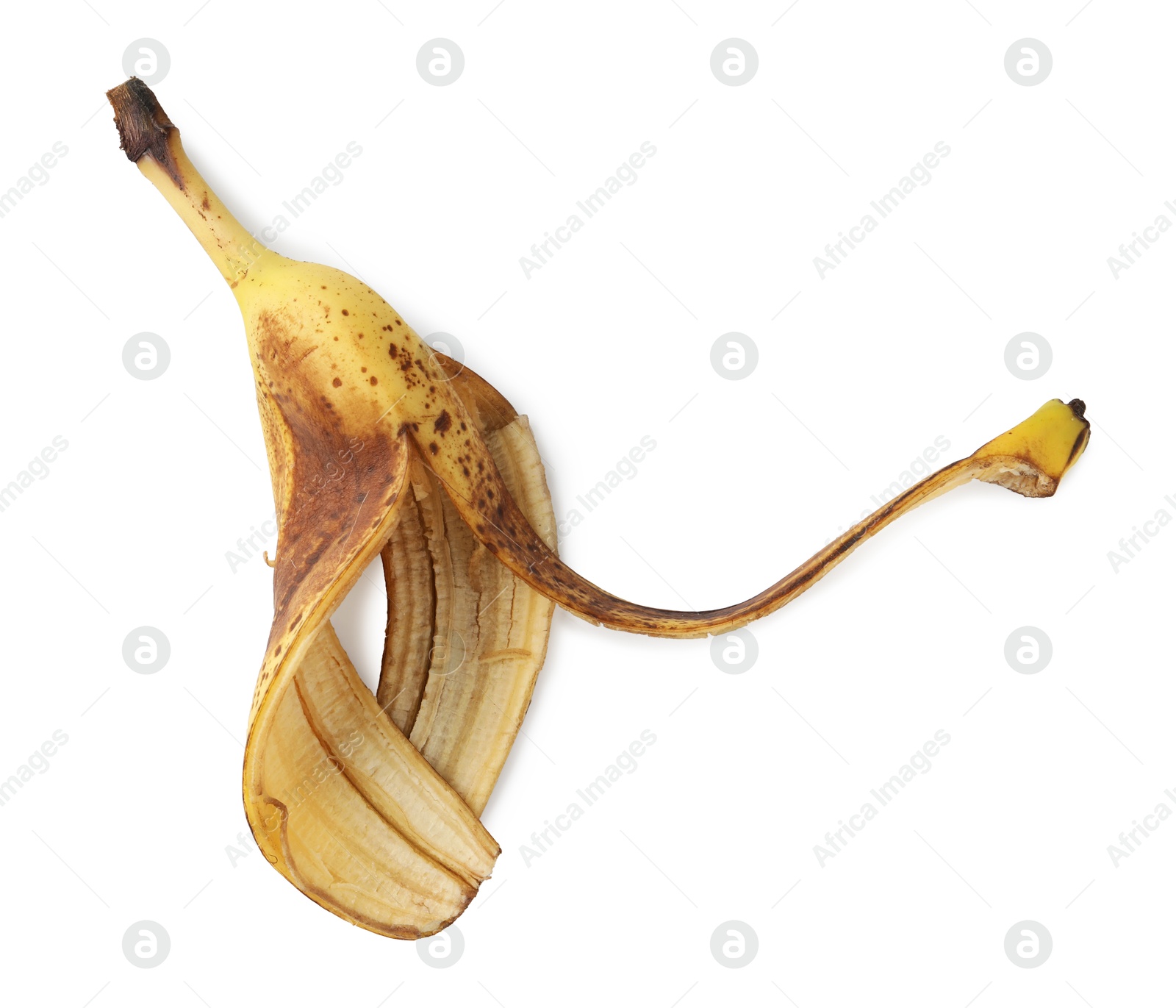 Photo of Banana peel with dark spots isolated on white, top view