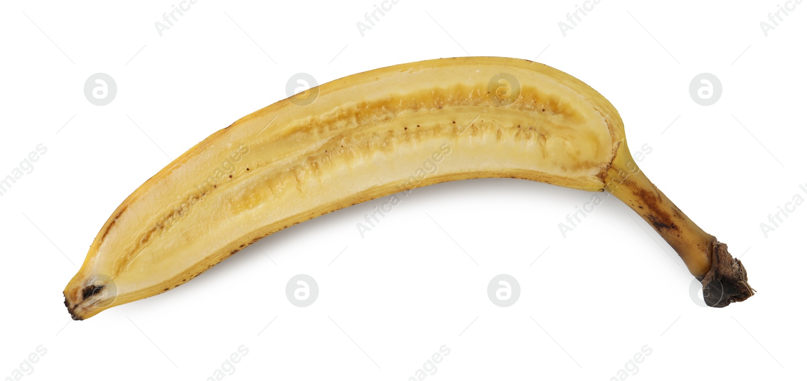 Photo of Half of ripe banana with dark spots isolated on white, top view