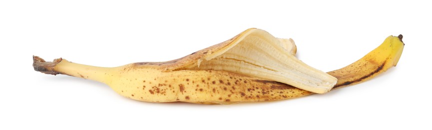 Banana peel with dark spots isolated on white