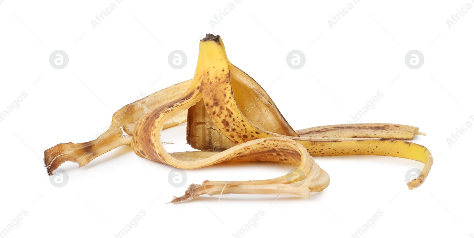 Photo of Banana peel with dark spots isolated on white