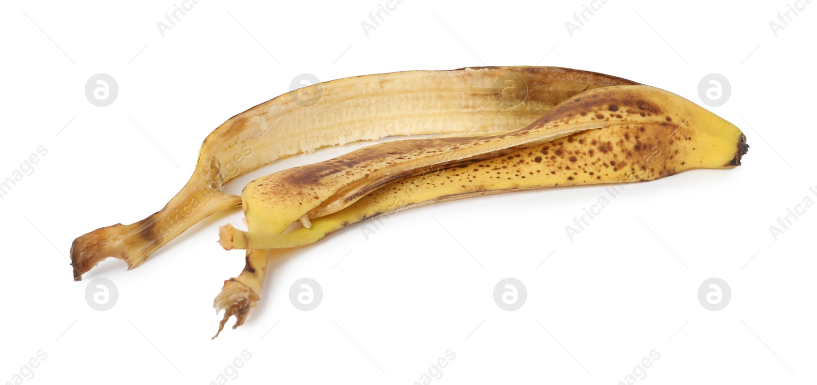 Photo of Banana peel with dark spots isolated on white