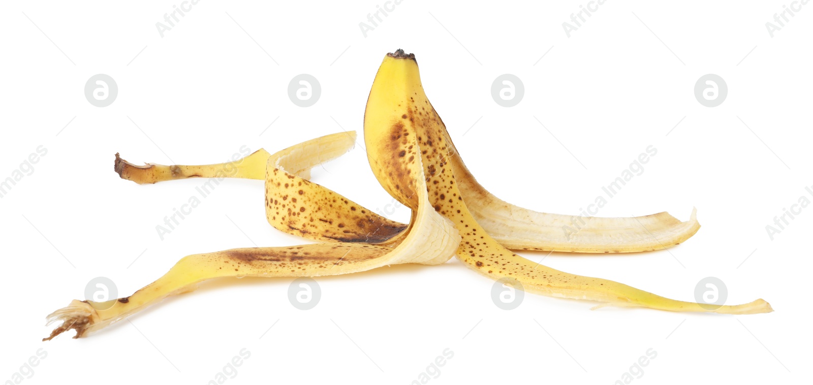 Photo of Banana peel with dark spots isolated on white