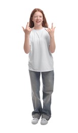 Photo of Teenage girl showing rock gesture on white background