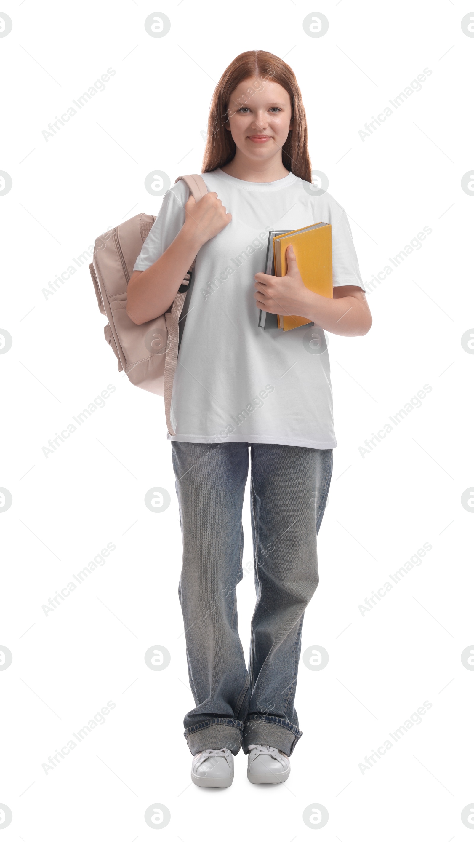 Photo of Teenage girl with backpack and books on white background