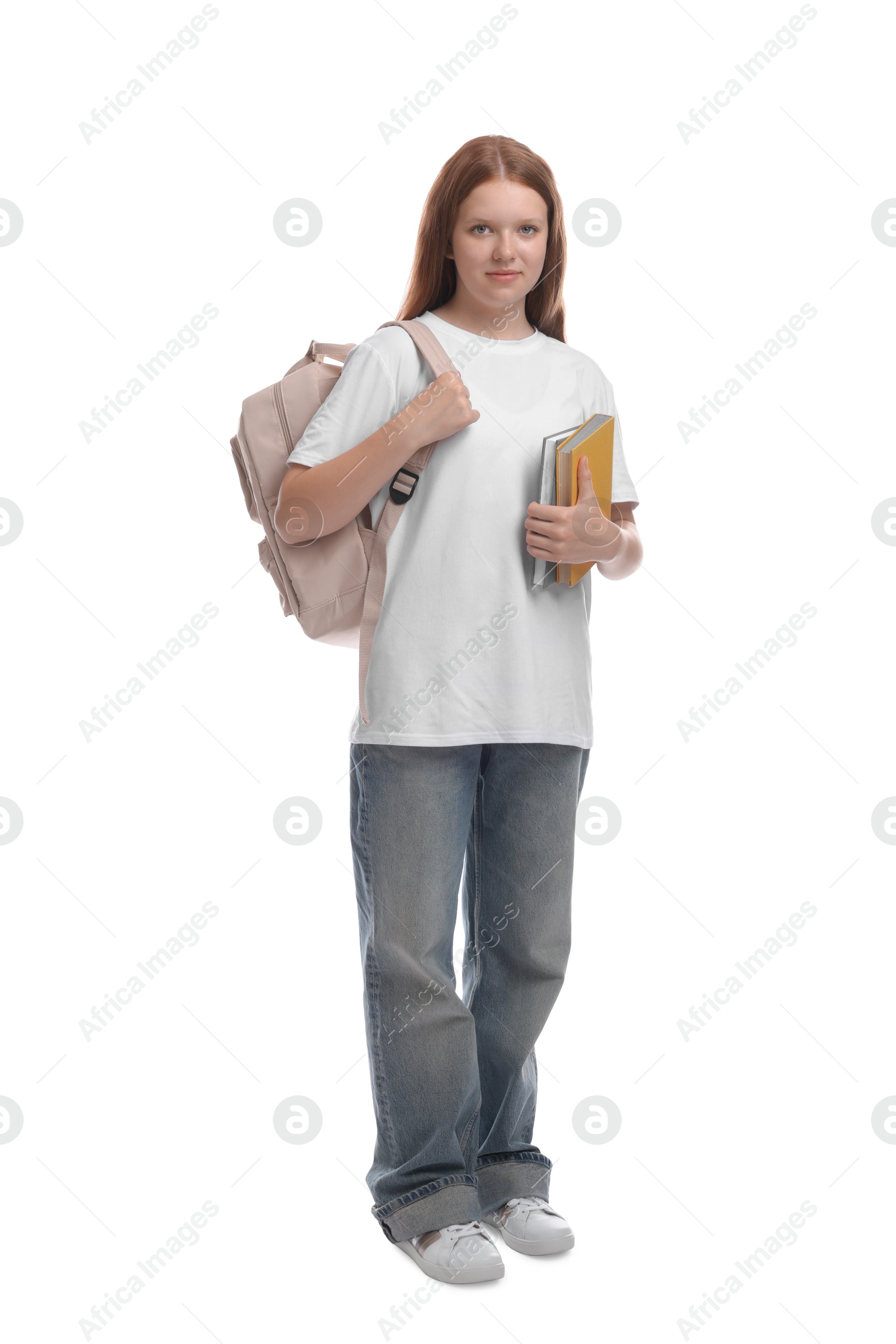 Photo of Teenage girl with backpack and books on white background