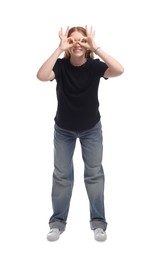 Cheerful teenage girl posing on white background