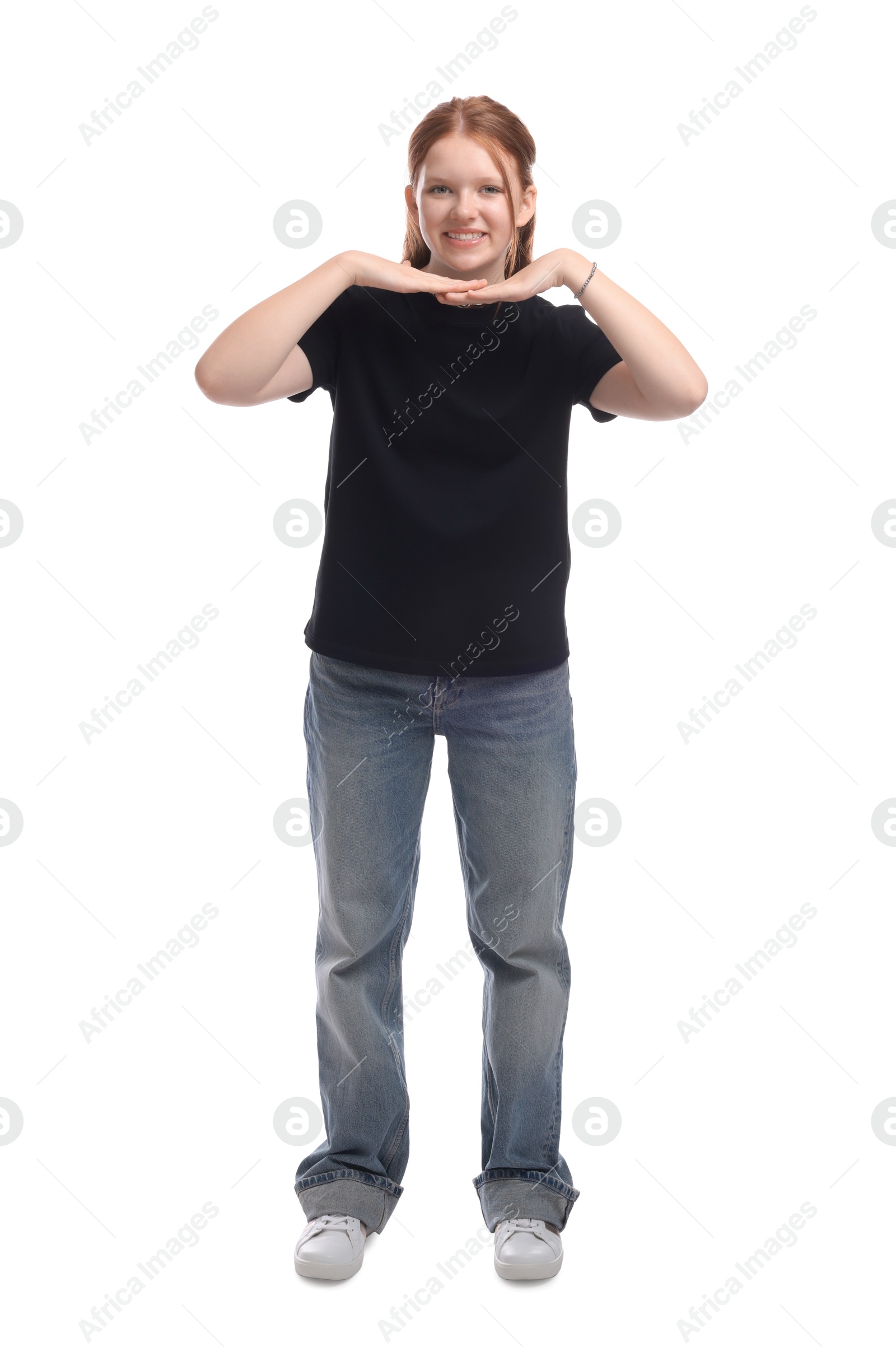 Photo of Full length portrait of teenage girl on white background