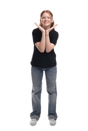 Photo of Full length portrait of teenage girl on white background