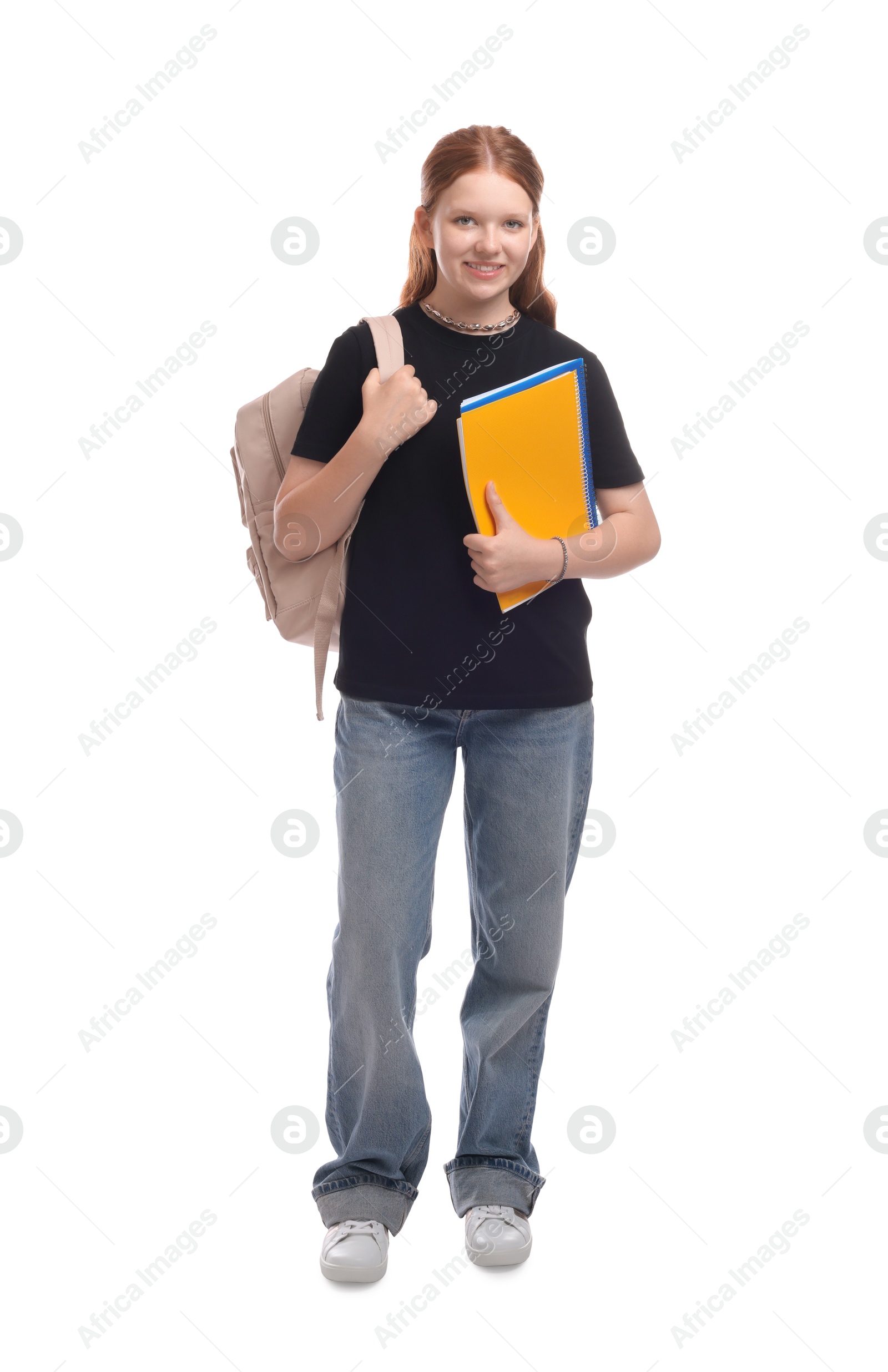 Photo of Teenage girl with backpack and books on white background