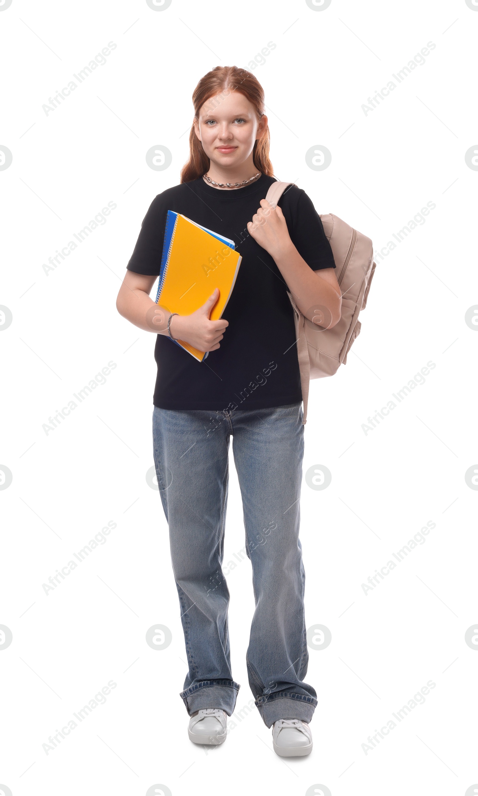 Photo of Teenage girl with backpack and books on white background