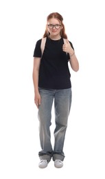 Teenage girl with backpack showing thumbs up on white background