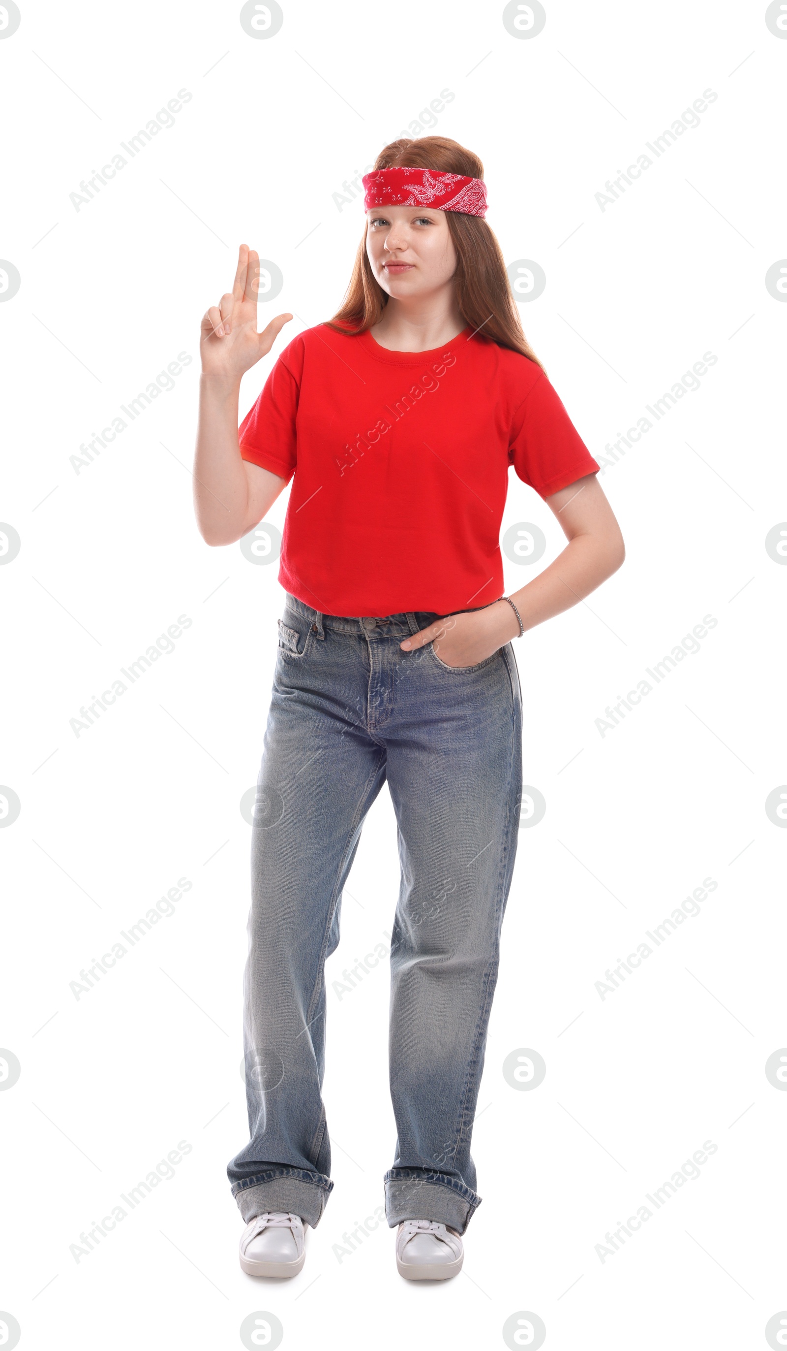 Photo of Teenage girl making finger gun gesture on white background