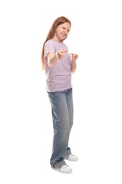 Full length portrait of teenage girl on white background