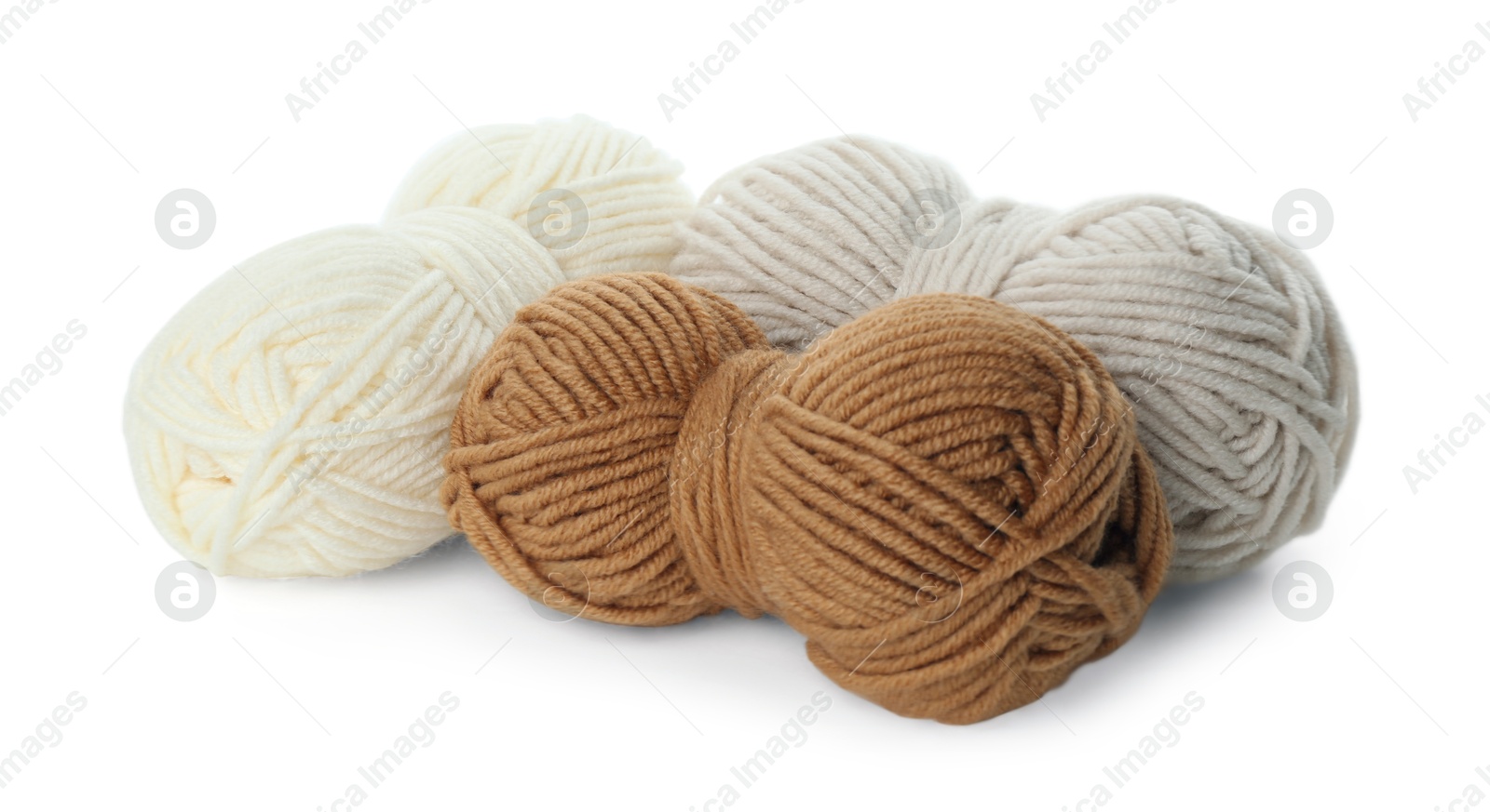 Photo of Skeins of soft yarn for knitting isolated on white