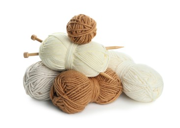 Photo of Skeins of soft yarn and knitting needles isolated on white