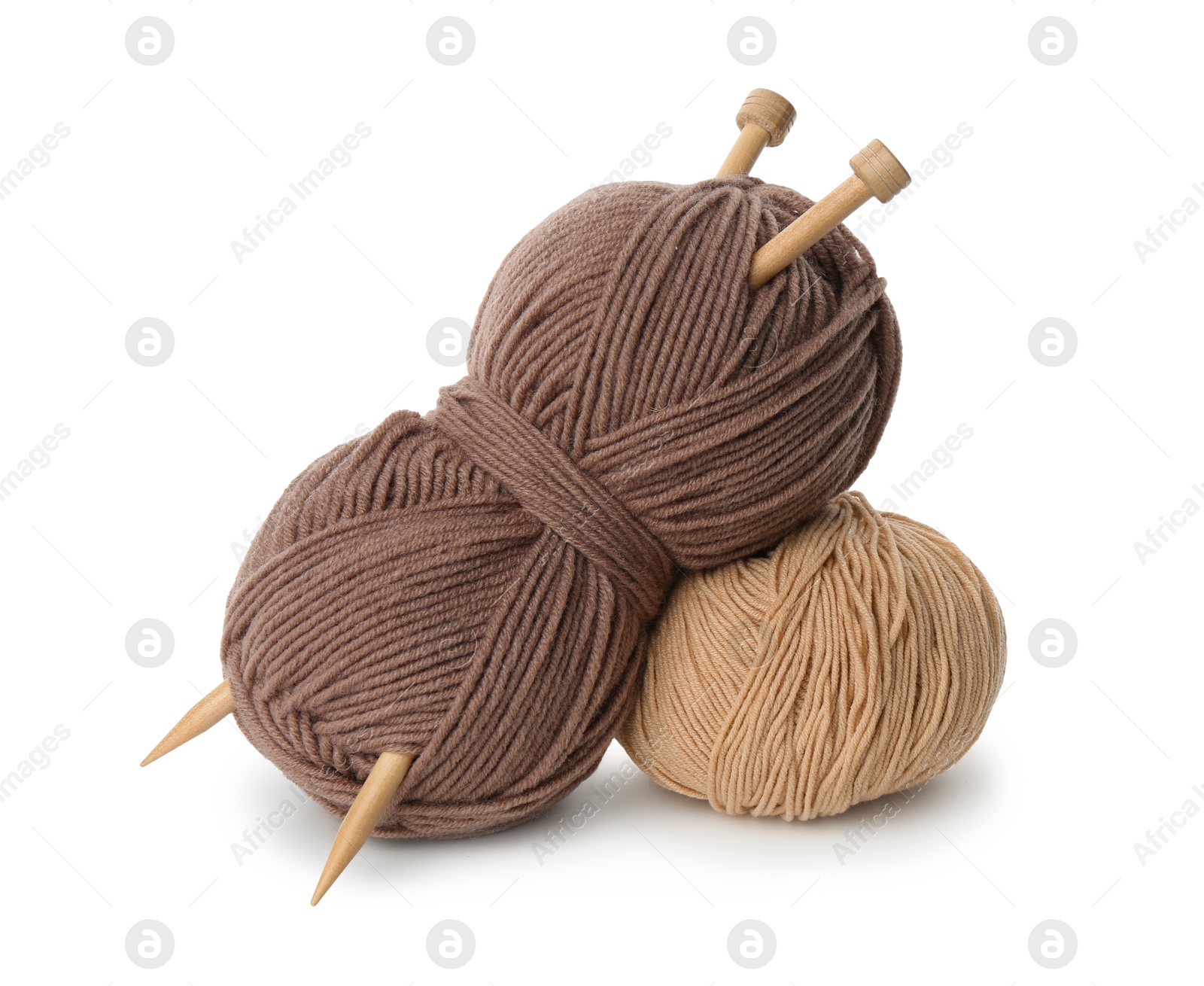 Photo of Skeins of soft yarn and knitting needles isolated on white