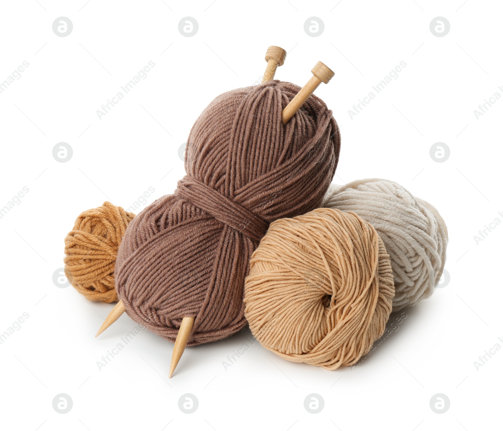 Photo of Skeins of soft yarn and knitting needles isolated on white