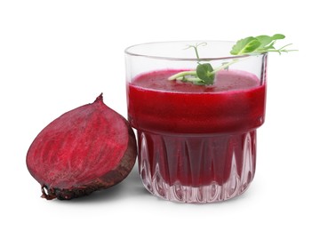 Photo of Tasty beetroot smoothie with microgreens in glass and fresh vegetable isolated on white. Vegan drink