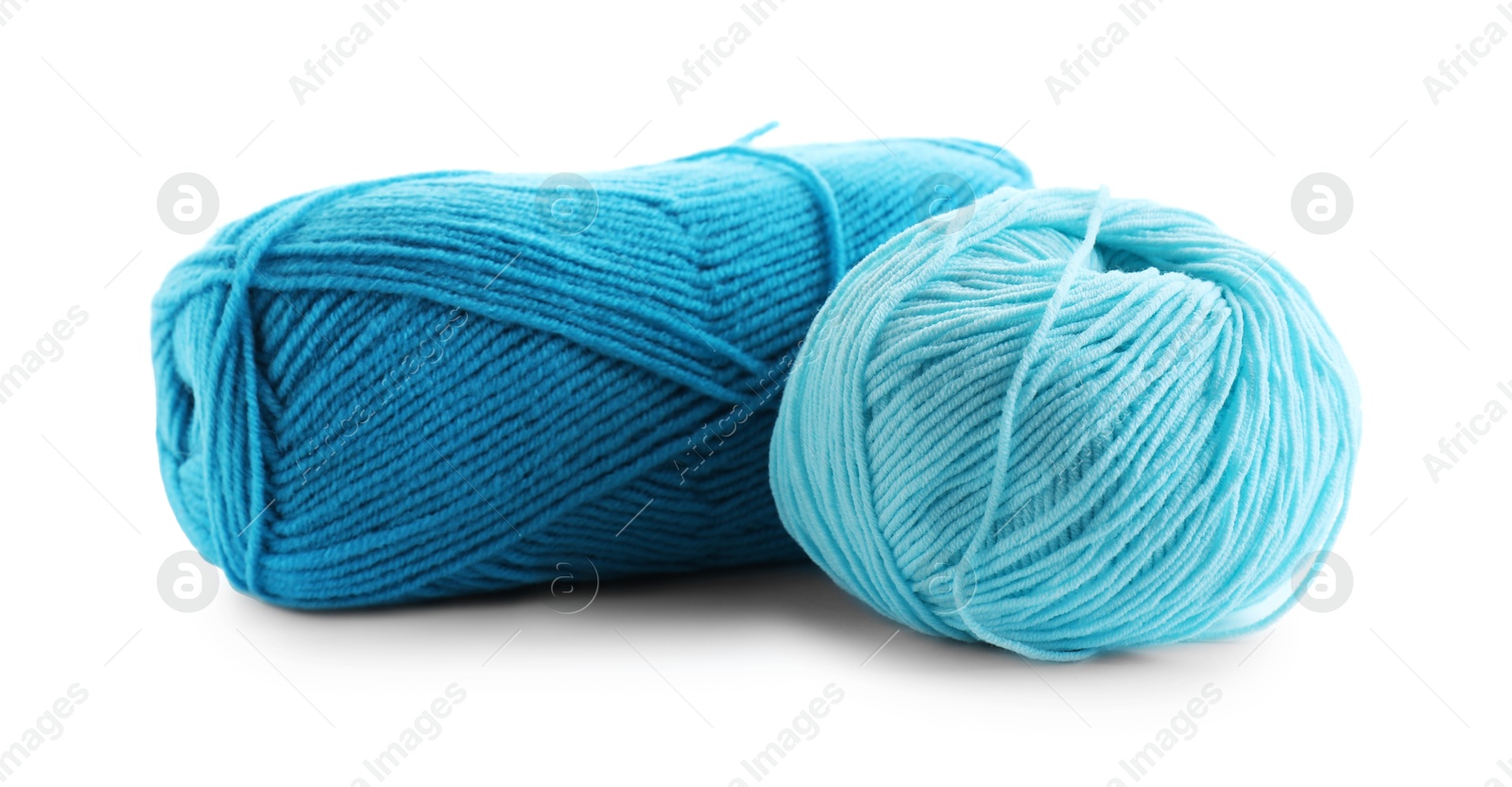 Photo of Two beautiful blue yarns isolated on white