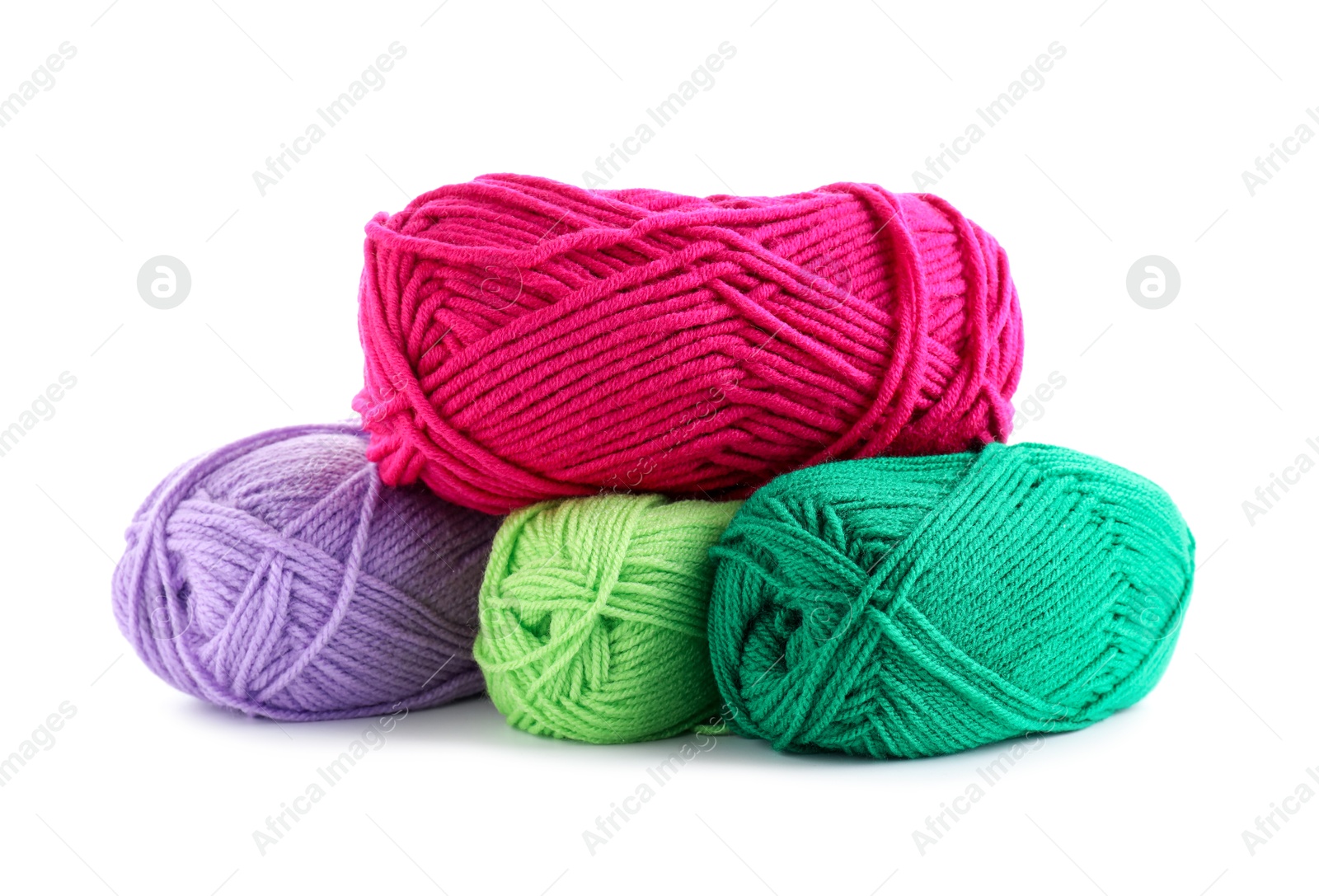 Photo of Many different bright yarns isolated on white