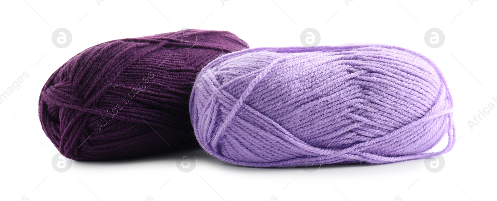 Photo of Two beautiful bright yarns isolated on white