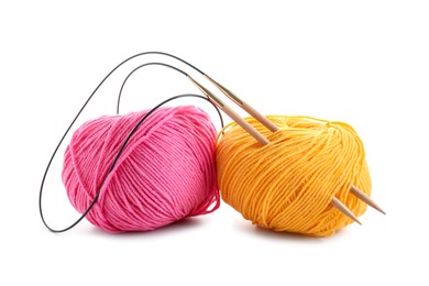 Photo of Two bright yarns and knitting needles isolated on white