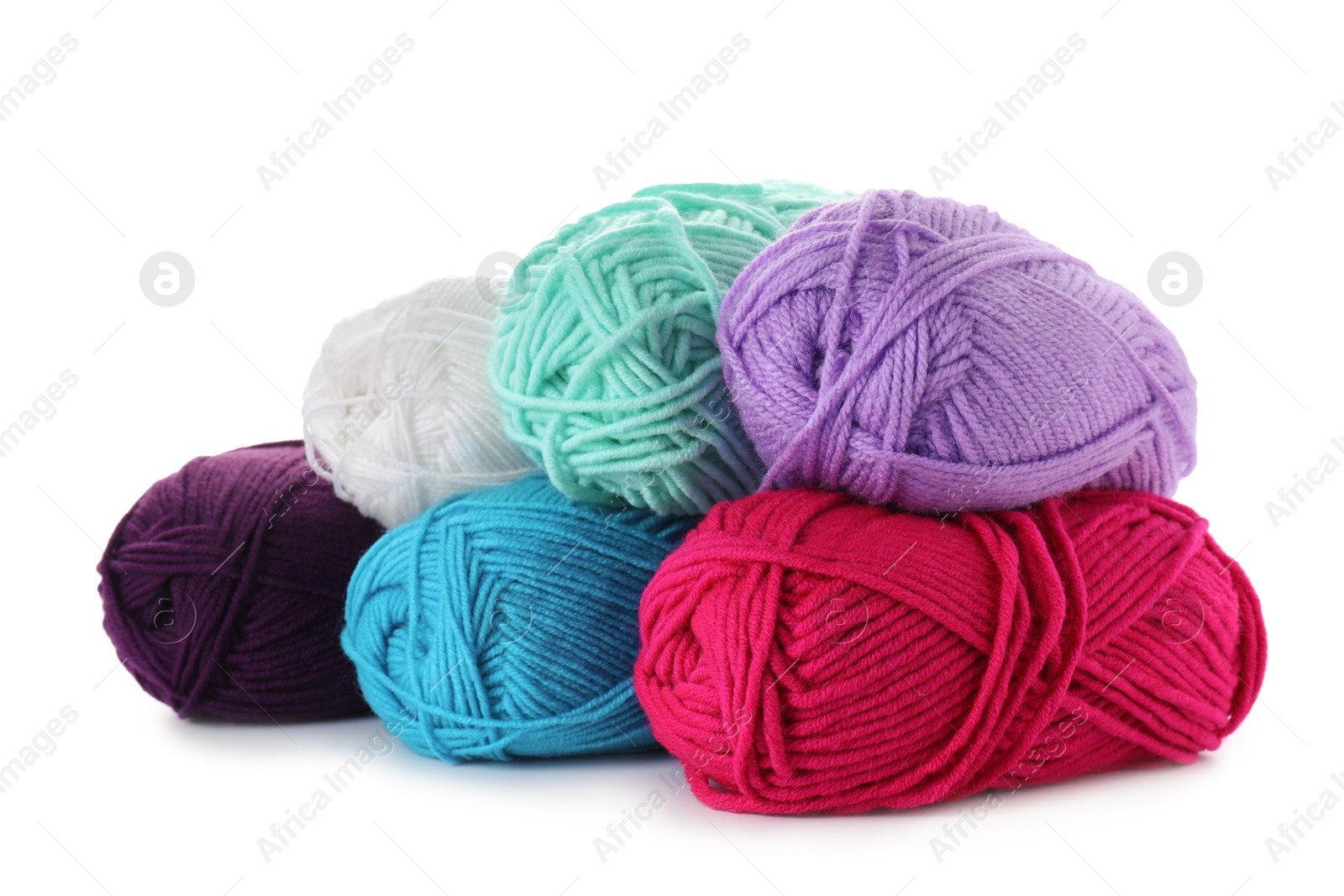 Photo of Many different bright yarns isolated on white