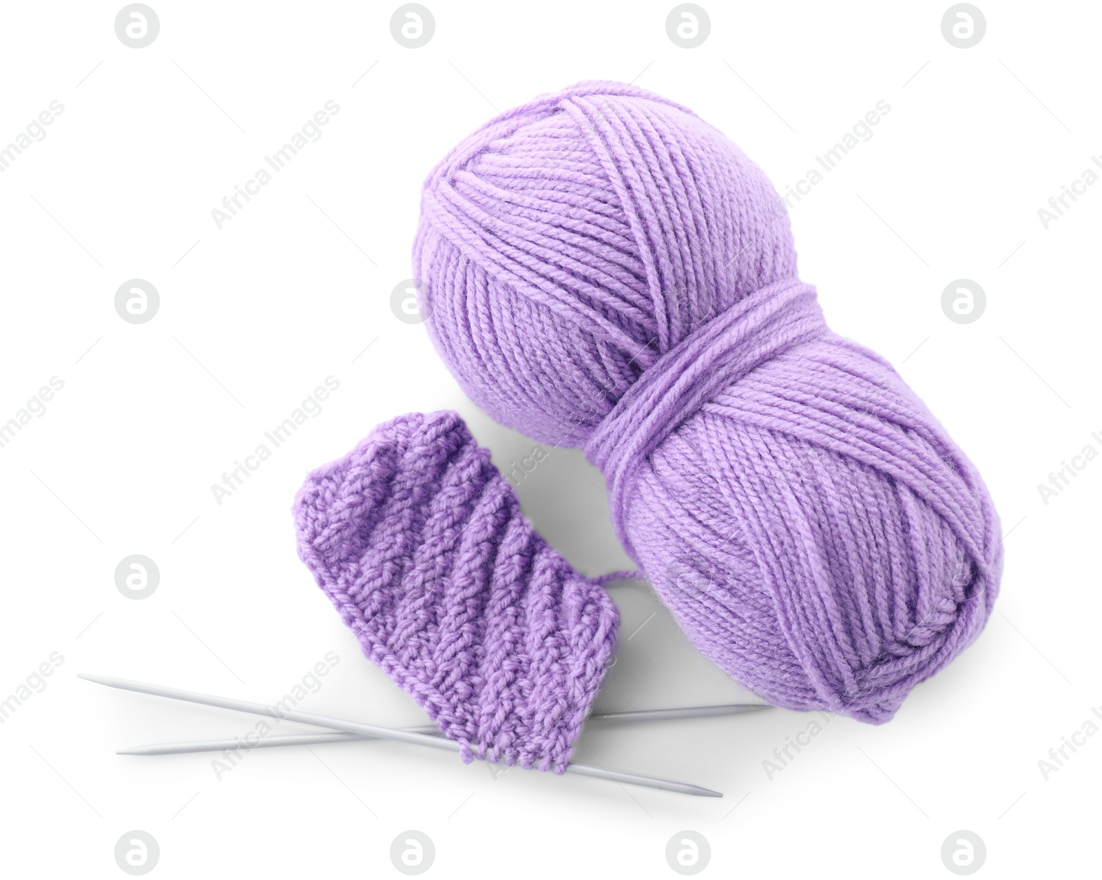 Photo of Skein of violet yarn, knitted fabric and needles isolated on white, top view