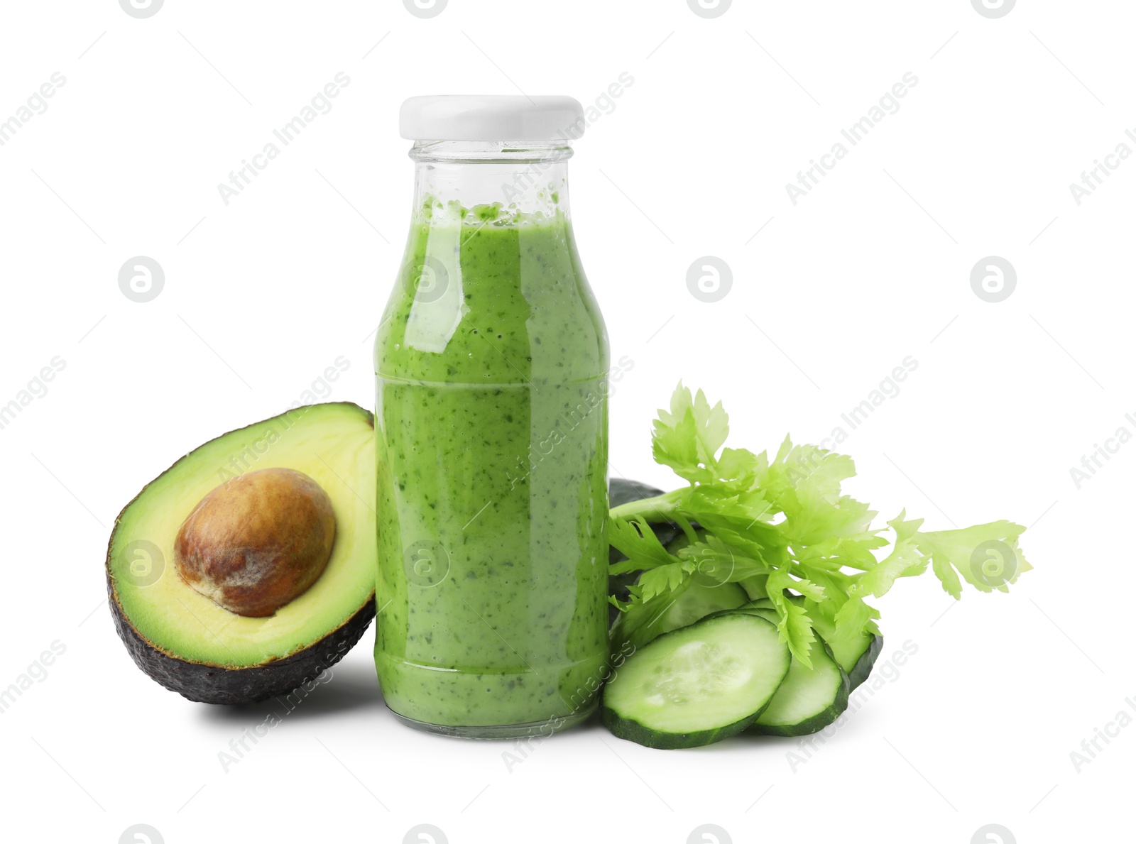 Photo of Tasty green smoothie in bottle, cucumber and avocado isolated on white