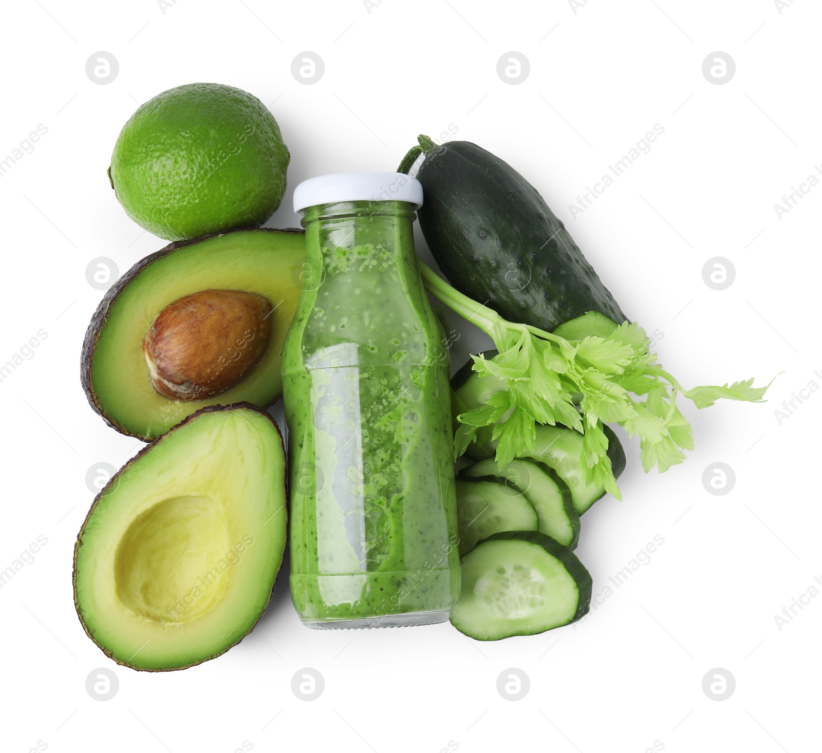 Photo of Tasty green smoothie in bottle, cucumber, lime and avocado isolated on white, top view