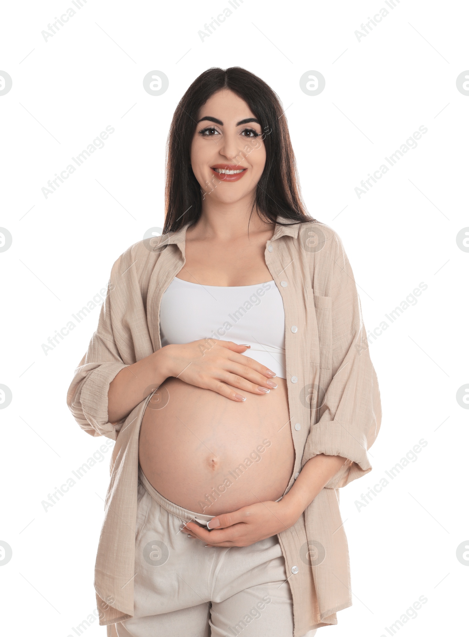 Photo of Portrait of beautiful pregnant woman on white background