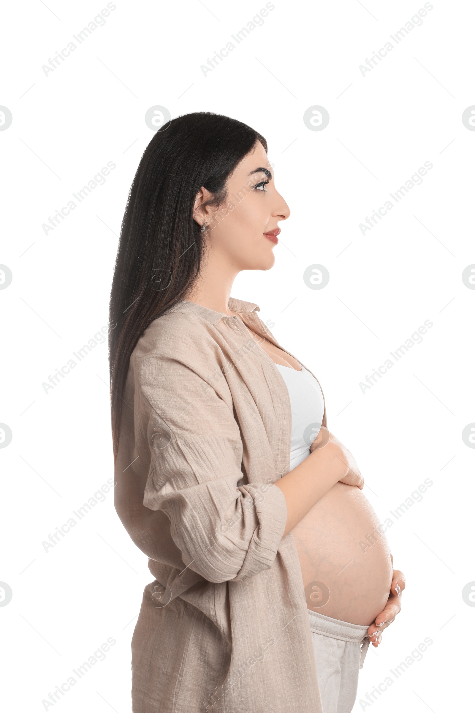 Photo of Portrait of beautiful pregnant woman on white background