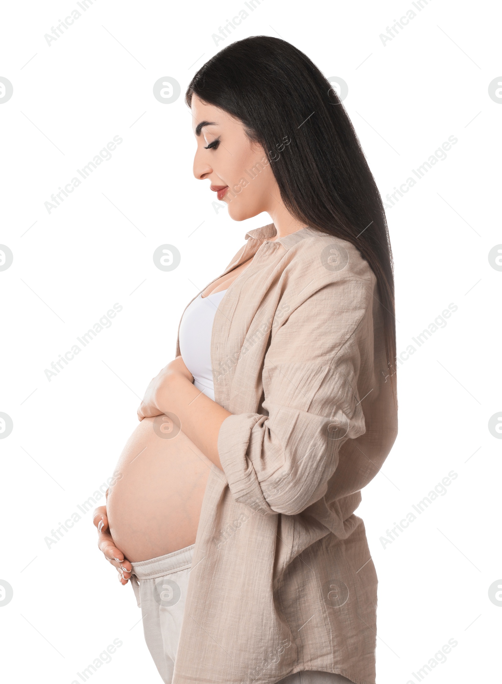 Photo of Portrait of beautiful pregnant woman on white background