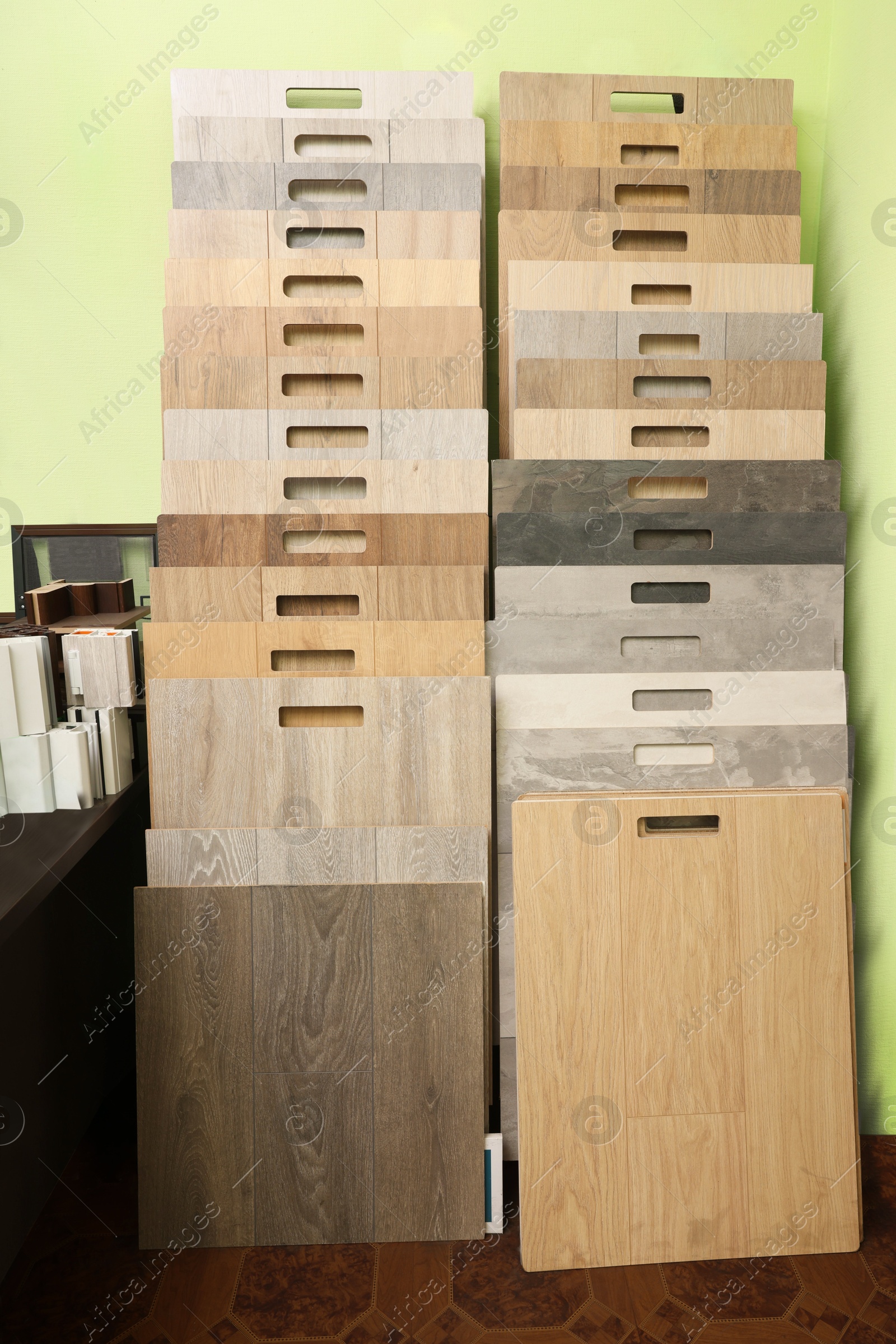 Photo of Many different samples of wooden flooring in store