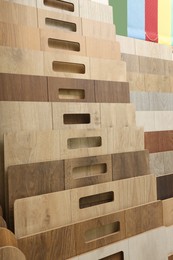 Photo of Many different samples of wooden flooring in store