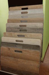 Photo of Many different samples of wooden flooring in store