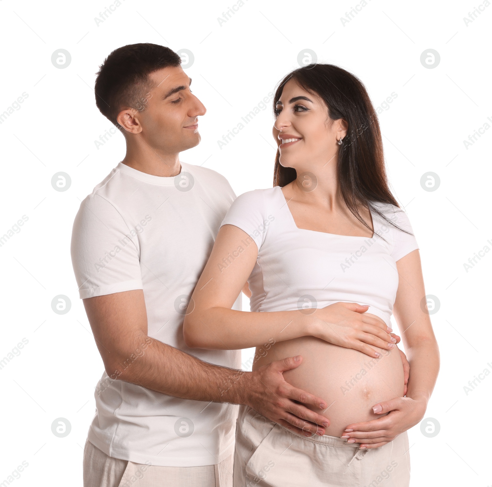 Photo of Beautiful pregnant woman with her husband isolated on white