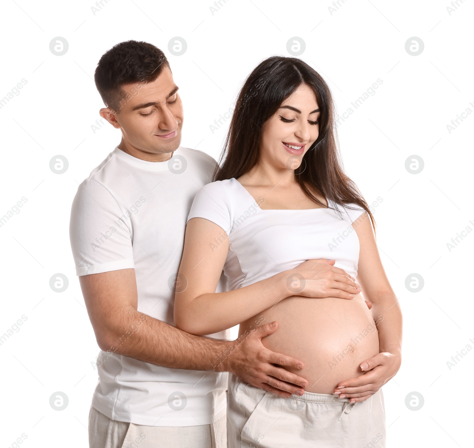 Photo of Beautiful pregnant woman with her husband isolated on white