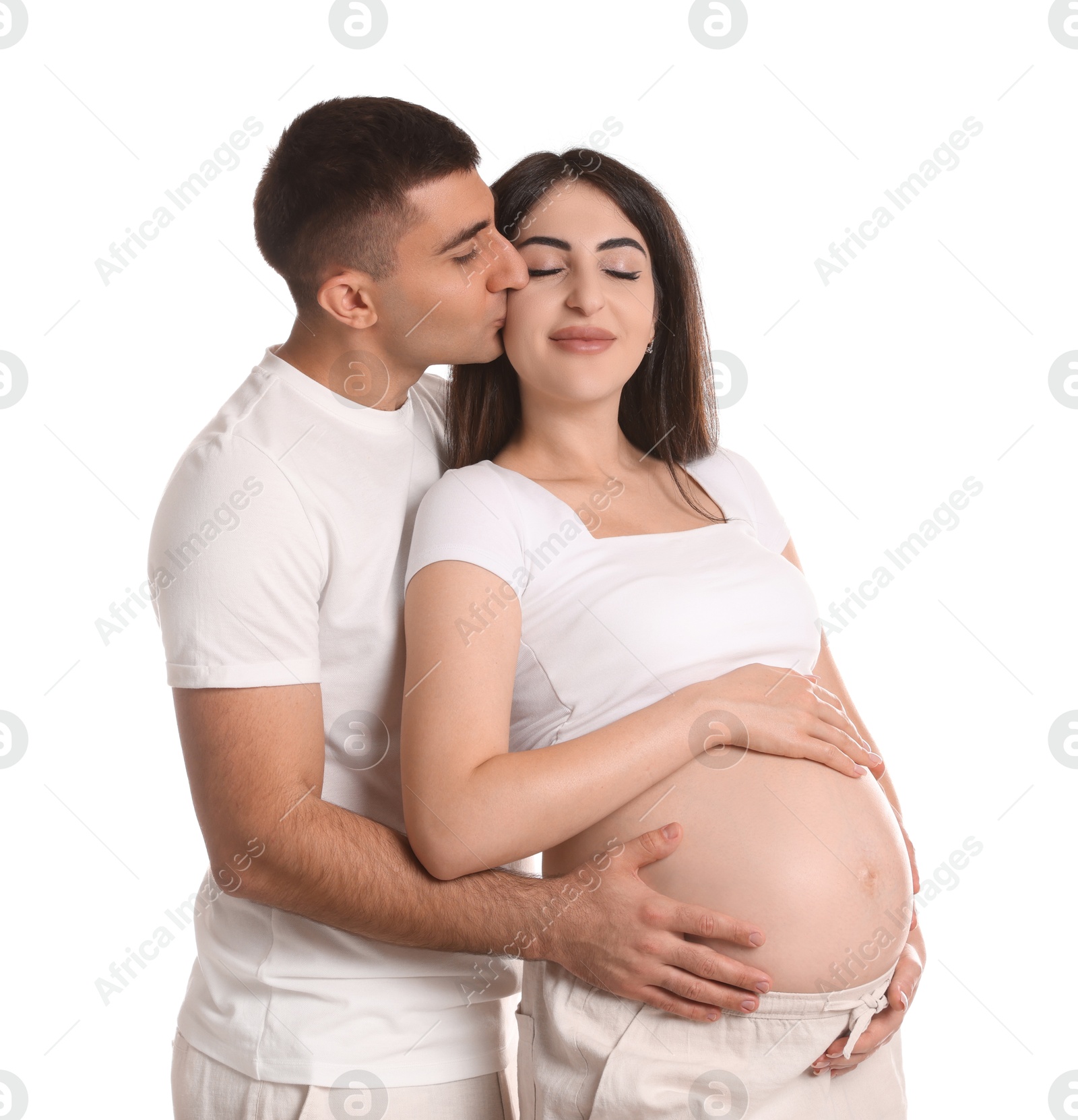 Photo of Beautiful pregnant woman with her husband isolated on white