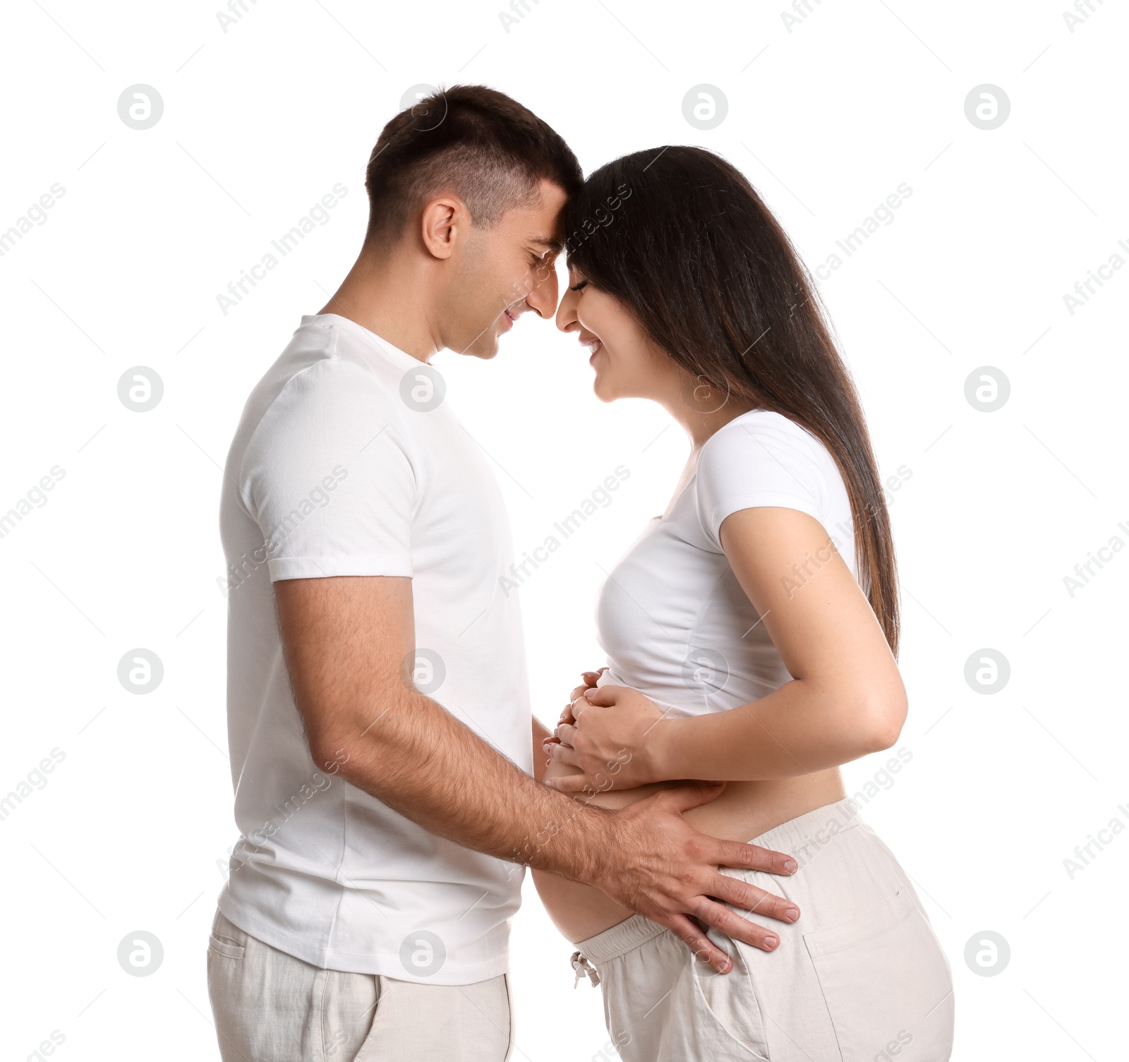 Photo of Beautiful pregnant woman with her husband isolated on white